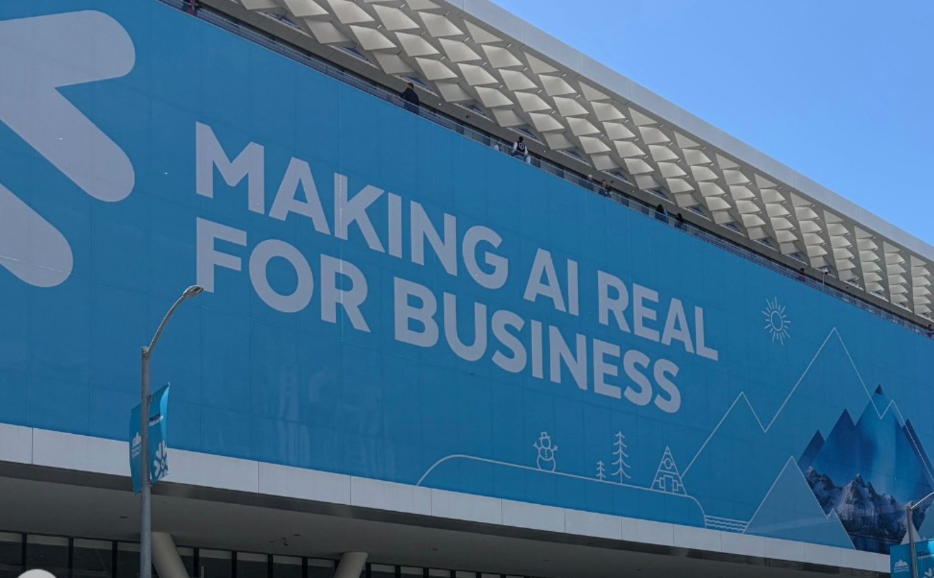 Summit 2026: the "Making AI Real for Business" theme wall